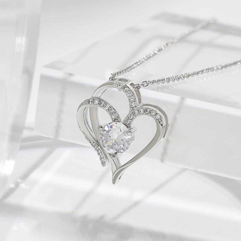 Collar de doble corazón con circonias y diamantes de imitación